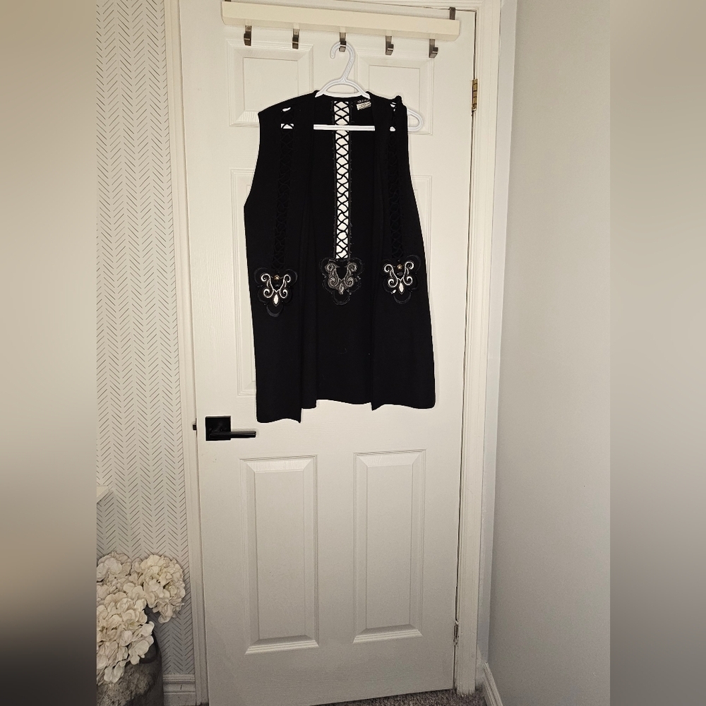 Black Sleeveless Top with Silver Accents